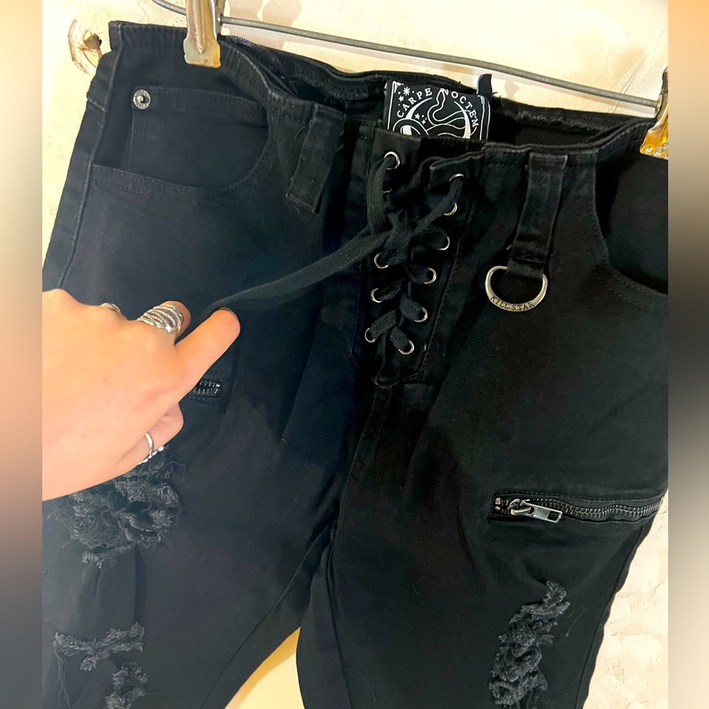 Unisex Killstar skinny jeans with lace up front